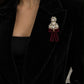 Golnar Earrings — styled on a blazer